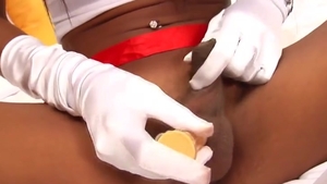 Tanned Ladyboy Nurse Teases With Her large scoops And lengthy penis